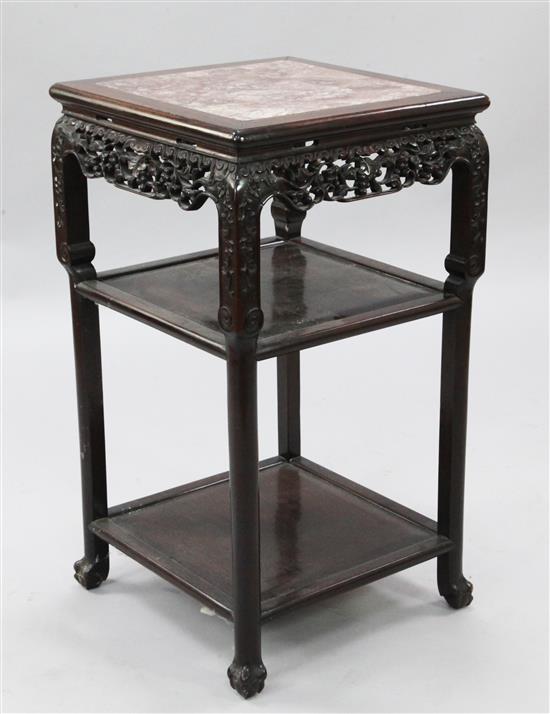 A Chinese hardwood three tier occasional table